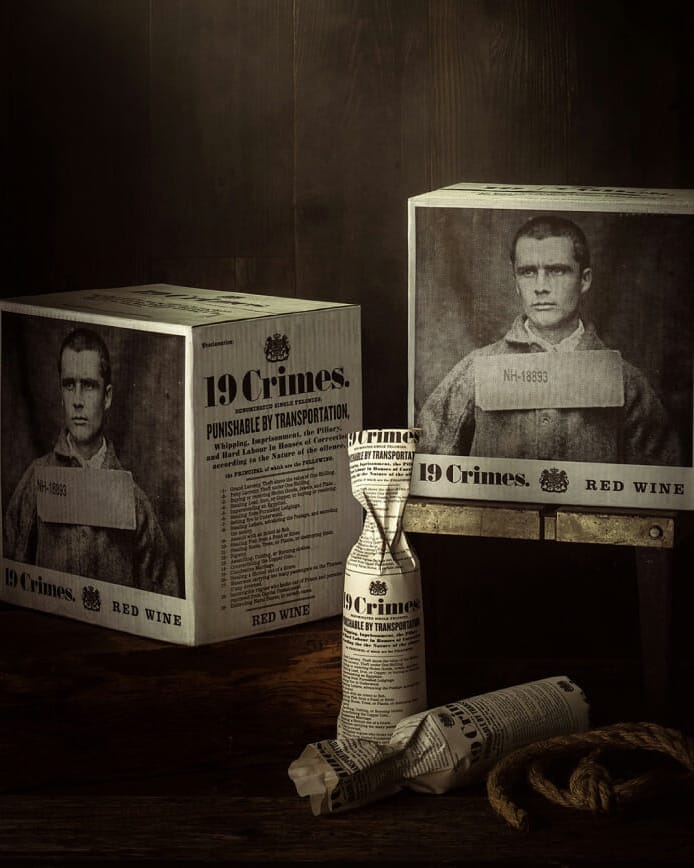 19 Crimes red wine with mug shots behind