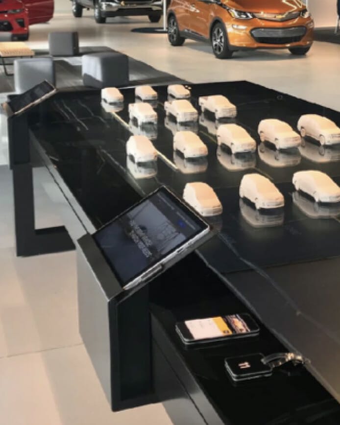 Model cars on modern display table